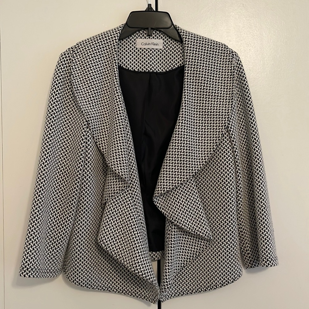 Calvin Klein jacket. Size S. Black $ White